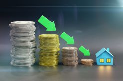 Green Down Arrows, House And Coins. Reducing Mortgage Rates